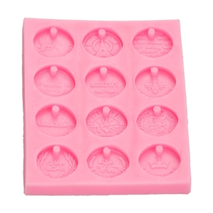 Pink 12-cavity silicone mold with embossed coin designs for DIY handmade crafts