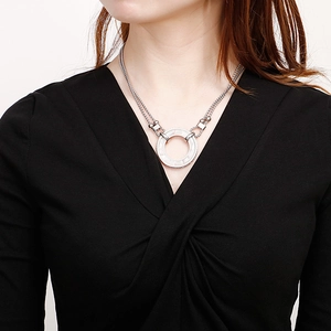 Double-layered silver titanium necklace with sparkling crystal encrusted round pendant