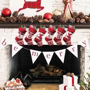 Set of 6 red and white knitted Christmas stockings with snowflake and reindeer patterns