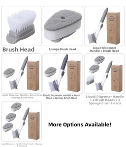 Close-up of the long-handle soap dispensing kitchen brush with nylon and sponge heads
