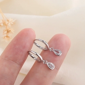 Elegant S925 silver hoop earrings with water drop zircon pendants for a minimalist look
