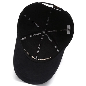 Internal structure of black cotton baseball cap with narason brand tape and stitching