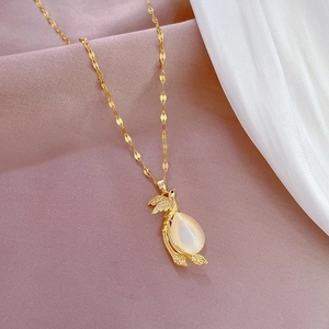 Luxurious gold phoenix necklace with sparkling crystals and water-drop opal stone