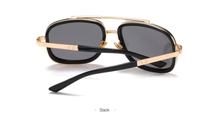 Back view of classic double-bridge pilot sunglasses with gold frame and grey lenses