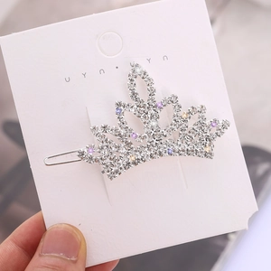 Elegant silver crown hair clip with sparkling rhinestones and colorful crystals