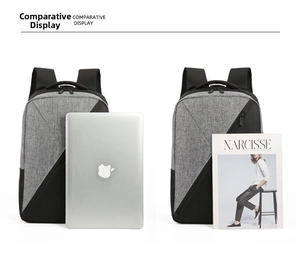 Size comparison of gray oxford laptop backpack with notebook and magazine