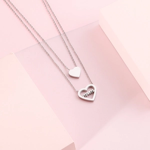 Double-layered silver heart necklace for women featuring a heart pendant and Mom letter charm