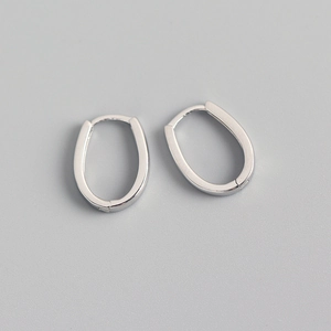 Close-up of minimalist S925 sterling silver U-shaped hoop earrings with polished finish