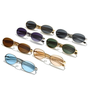 Lunettes de soleil rétro à monture ovale en métal, verres multicolores et style chic