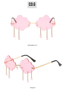 Detail of pink cloud-shaped rimless sunglasses with dangling crystal raindrop charms