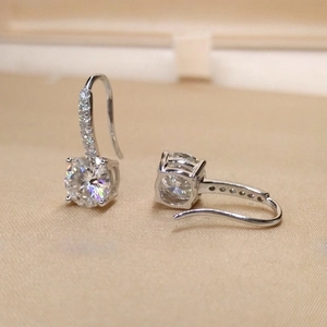 Elegant silver drop earrings with round cubic zirconia stones and pave crystal hooks