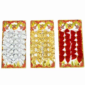 Set of 36 Christmas bows in gold, silver, and red velvet for holiday tree decoration