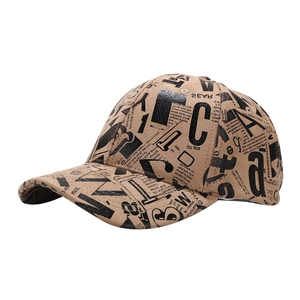 Graffiti print baseball cap in khaki with vintage newspaper style lettering for women