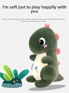 Detail of green plush dinosaur toy featuring soft fabric and colorful candy embroidery