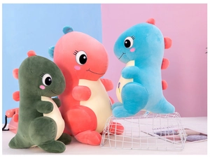 Detailed view of plush dinosaur dolls in green, pink, and blue with soft down cotton fill