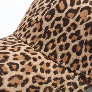 Macro shot of leopard print baseball cap showcasing faux suede texture and fine stitching