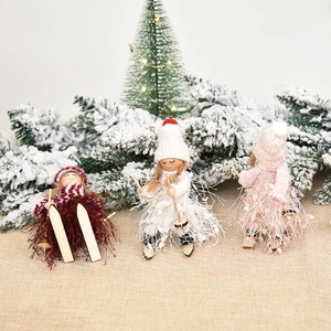 Three-piece knit skiing angel Christmas tree ornaments in red, white and pink