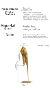 Detail view of golden resin parrot sculpture showing intricate feather texture and metal finish