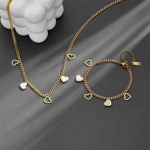 Elegant stainless steel gold jewelry set with heart pendants and mother-of-pearl inlays