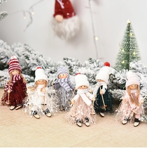 Detail of creative wooden skiing dolls with tassel yarn for Christmas tree decoration
