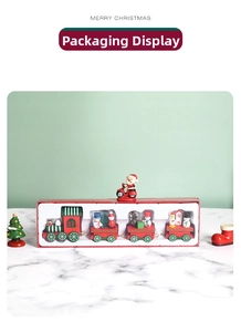 Detailed view of 4-piece wooden Christmas train toy set in window gift packaging