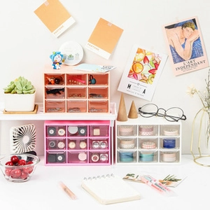 Detail view of 9-grid desktop organizer drawers for cosmetics and stationery storage