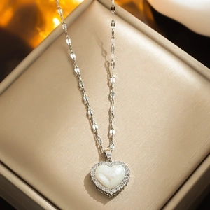 Elegant titanium steel necklace with heart pendant featuring pearl inlay and zircons