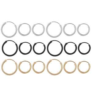 Minimalist round hoop earrings set in silver, black and gold steel finishes
