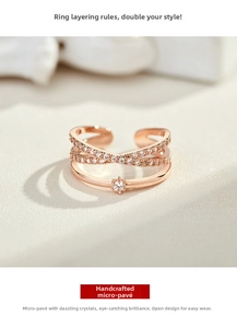 Detailed macro view of adjustable rose gold cross ring with hand-set micro-paving stones