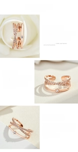 Detail of 18K rose gold plated cross ring with sparkling zircon and adjustable band