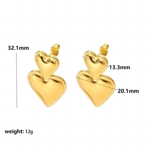 Polished golden stainless steel tiered heart drop earrings with high gloss finish