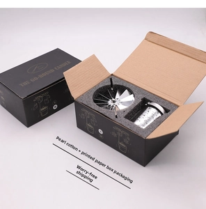 Detailed view of silver rotary candle holder set in luxury black gift box packaging