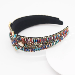Close-up of luxury Baroque headband with colorful rhinestones and crystal gemstones