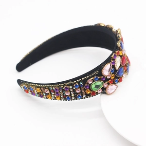 Detailed close-up of Baroque headband with multicolored rhinestones and colorful crystals