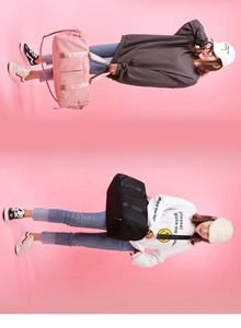 Detail showing pink and black gym bags with dedicated shoe compartment and shoulder strap