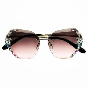 Oversized butterfly rimless sunglasses with pink gradient lenses and rhinestone accents