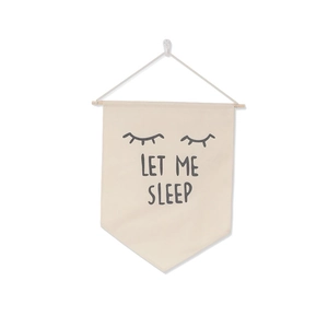 Detail of canvas pin banner with LET ME SLEEP quote and closed eyelashes design