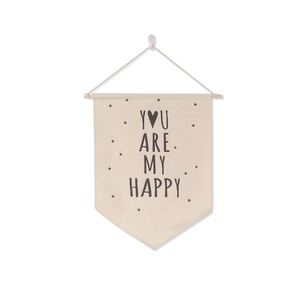 Detail of canvas banner hanging on a wooden rod with black You Are My Happy text
