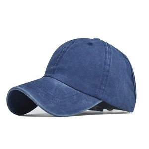 Detailed view of deep blue washed cotton ponytail baseball cap with retro texture