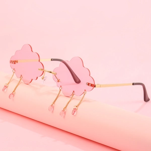 Cloud-shaped pink sunglasses with gold metal frame and hanging crystal tassels