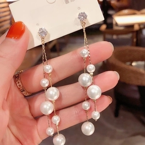 Elegant long tassel pearl earrings with gold chains and 925 silver needle studs