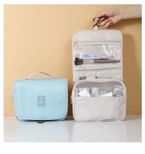 Hanging toiletry bag with multiple compartments and hook for organized travel storage