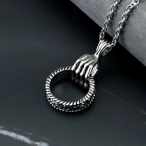 Hip hop style silver skull hand pendant necklace in polished stainless steel for men