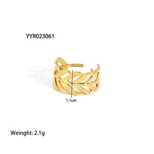 Detail of 18K gold plated stainless steel feather ring showing 1.1cm width and 2.1g weight