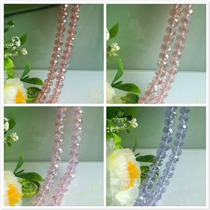 Detail of faceted AB crystal beads in pink and purple for DIY jewelry making