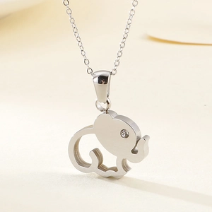 Minimalist silver elephant pendant necklace with hollow design and crystal eye detail