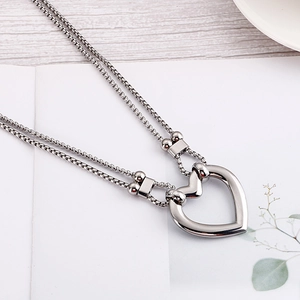 Double-layer stainless steel box chain necklace with a large hollow silver heart pendant