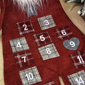 Linen Christmas countdown calendar with red pockets and white faux fur trim decor