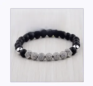 Detail of beaded bracelet with black matte beads and 8mm silver zircon pave balls