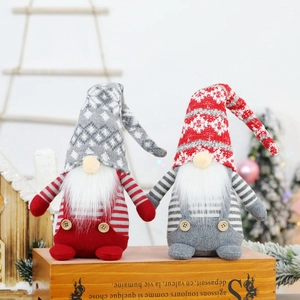 Set of 2 Christmas gnomes with knitted hats and long beards on a wooden base